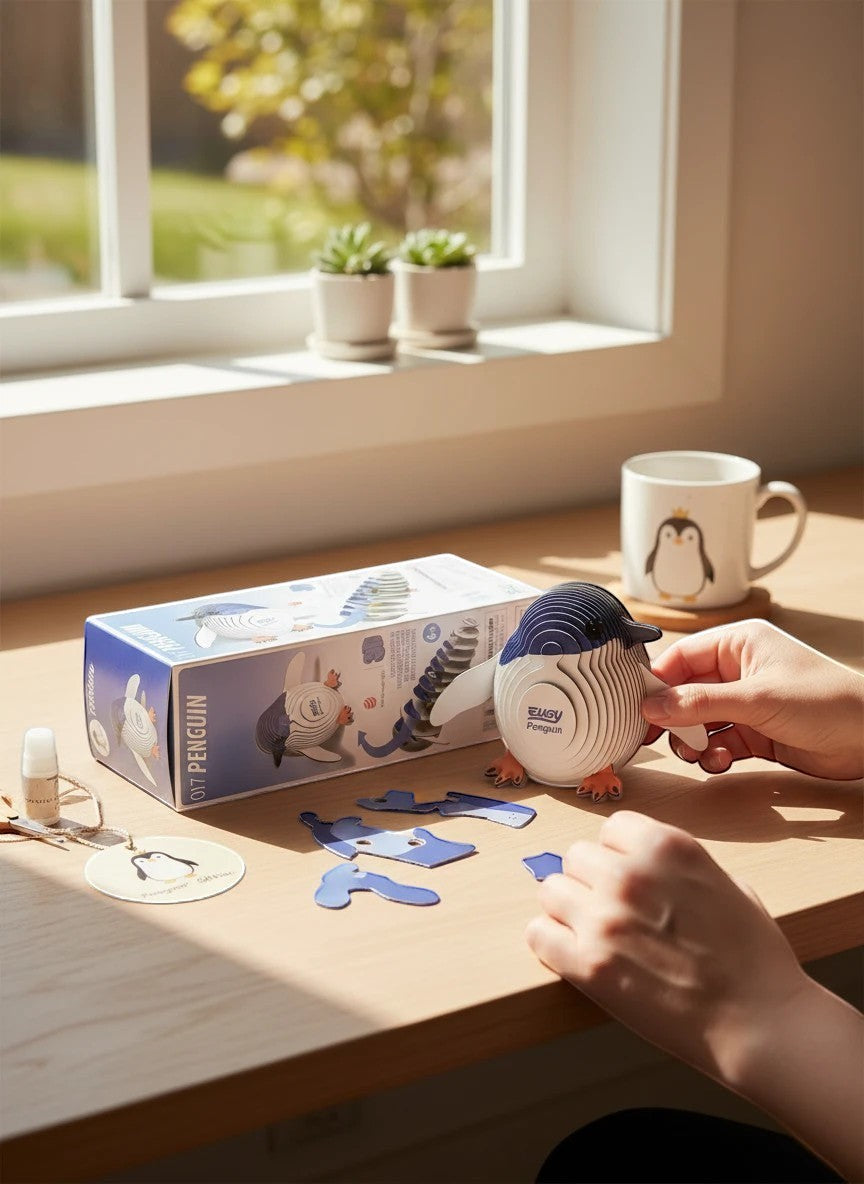 Penguroo® Gifts Inc. Penguin cardboard model building kit for kids, featuring pre-cut pieces and easy assembly. Develops fine motor skills.